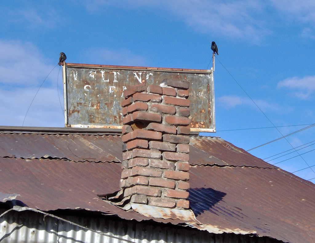Real brick chimney masonry repair and tuckpointing